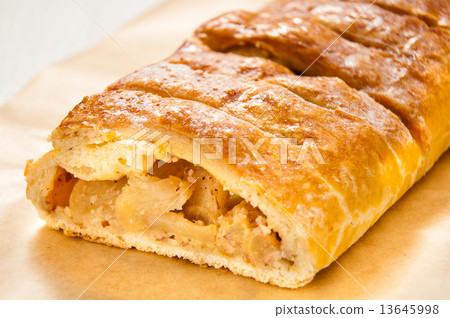 slice of an apple strudel on the table 13645998
