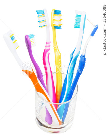tooth brushes and interdental brush in clear glass 13646089