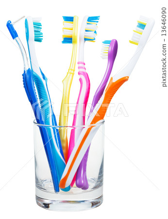 toothbrushes and interdental brush in clear glass 13646090