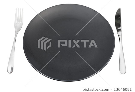 black plate with fork and knife isolated on white 13646091