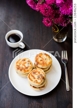 Delicious homemade cheese pancakes with black coffee Delicious homemade cheese pancakes with black coffee 13646253