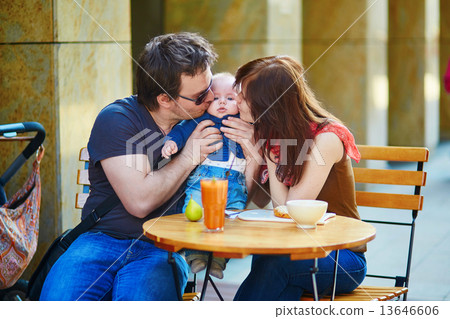 Happy family of three together 13646606