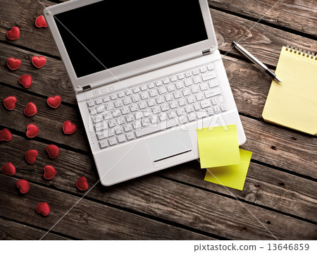 White laptop and hearts with sticky notes White laptop and hearts with sticky notes 13646859
