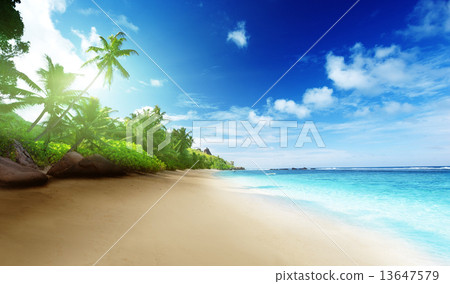 beach in sunset time on Mahe island in Seychelles 13647579
