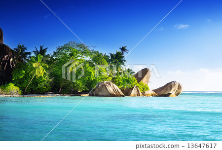 sunset on the beach, Anse Source d'Argent, La Digue island, Seyc 13647617
