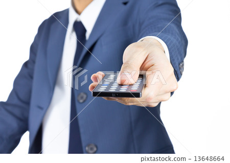 Businessman with Remote Control Isolated on White Background 13648664