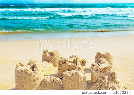 Destroyed sand castle on a beach. Spain Destroyed sand castle on a beach. Spain 13650284