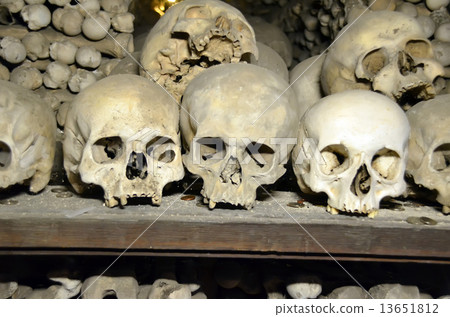 human skulls and bones in ossuary photo 13651812