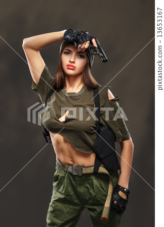 Sexy girl with gun. 13653167