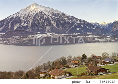 Lakeview over Swiss Apls mountains in a Swiss village near the T 13655938