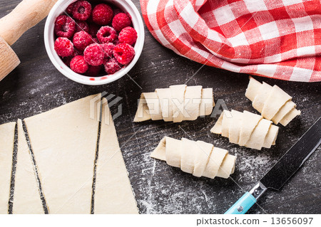 Making croissants with raspberries Making croissants with raspberries 13656097