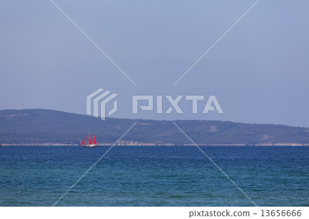 Yacht with red sails 13656666