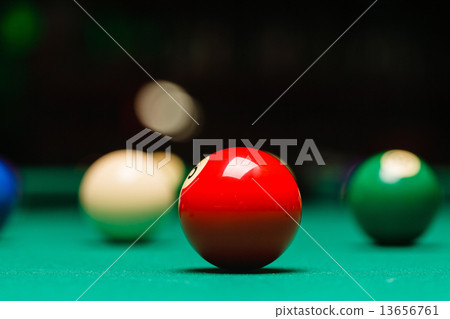 Billiard balls in a pool table. 13656761