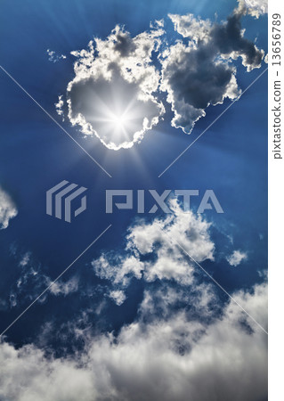 Bright sun in blue sky Bright sun in blue sky 13656789