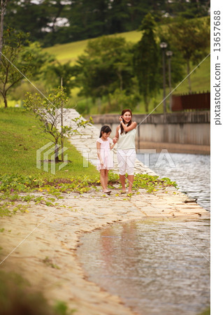 Family, Three, happy, pretty, handsome, kid, embrace, park, couple, outdoor activity, picnic, enjoys 13657688