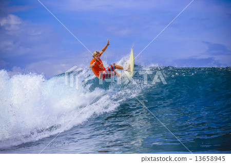 Surfer on Amazing Blue Wave Surfer on Amazing Blue Wave 13658945