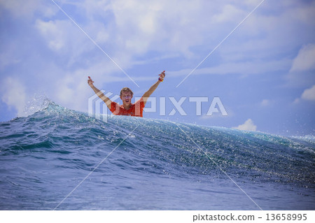 Surfer on Amazing Blue Wave 13658995