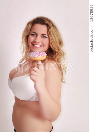 Woman with big tits has a colorful muffin on the finger 13678935