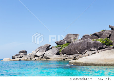 Similan Islands with rocks and turquoise sea Similan Islands with rocks and turquoise sea 13679519