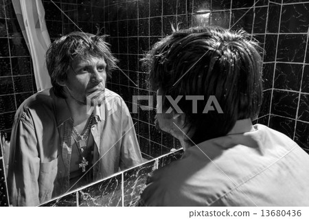 Drunk Man looks at himself in the mirror Drunk Man looks at himself in the mirror 13680436