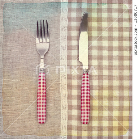 Fork and knife on napkin. Vintage retro style. Paper textured. Fork and knife on napkin. Vintage retro style. Paper textured. 13680717