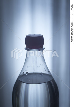 Soda lemonade soft drink bottle plain blue studio background Soda lemonade soft drink bottle plain blue studio background 13682582