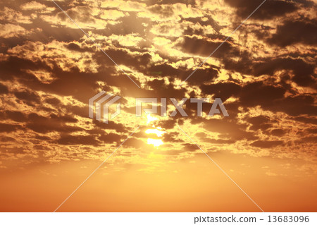 Sun behind cloud orange warm sky Sun behind cloud orange warm sky 13683096