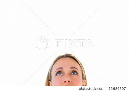 Close up of blonde woman looking up Close up of blonde woman looking up 13684807
