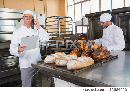 Upset baker making phone calls Upset baker making phone calls 13684920