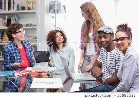Fashion students working as a team 13685518