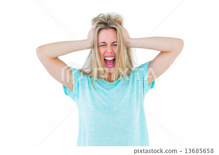 Furious blonde standing and yelling 13685658