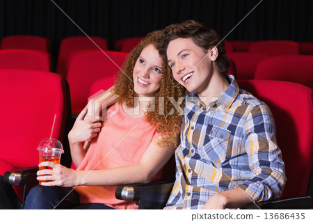 Young couple watching a film 13686435