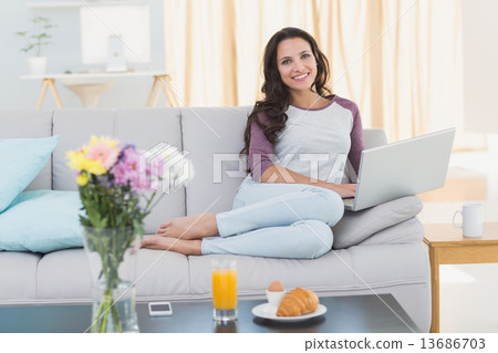 Pretty brunette relaxing at the weekend 13686703