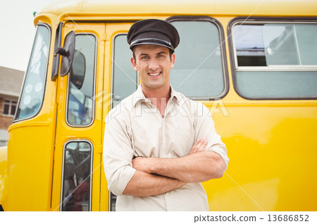Smiling bus driver looking at camera Smiling bus driver looking at camera 13686852