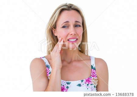 Beautiful blonde getting teeth pain Beautiful blonde getting teeth pain 13688378