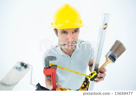 Carpenter with various equipment Carpenter with various equipment 13689477