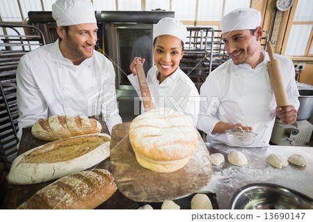 Stock Photo: Team of bakers working together