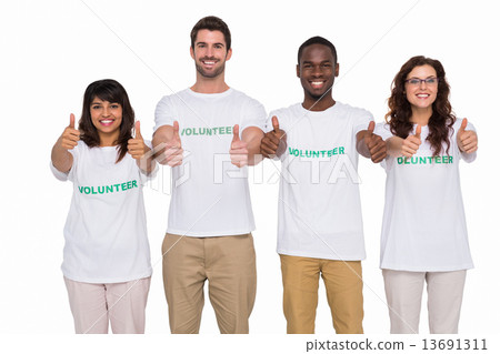 Positive teamwork smiling with thumbs up Positive teamwork smiling with thumbs up 13691311