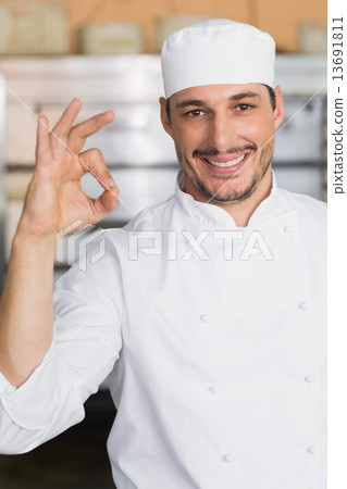 Smiling baker looking at camera Smiling baker looking at camera 13691811