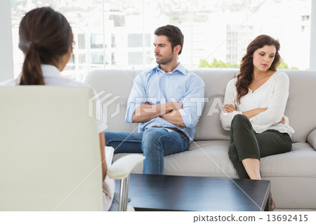 Stock Photo: Psychologist helping a couple with relationship difficulties