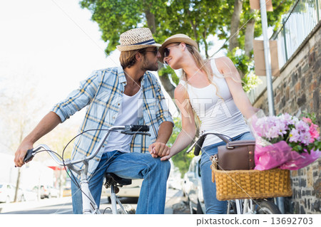 Attractive couple on a bike ride 13692703