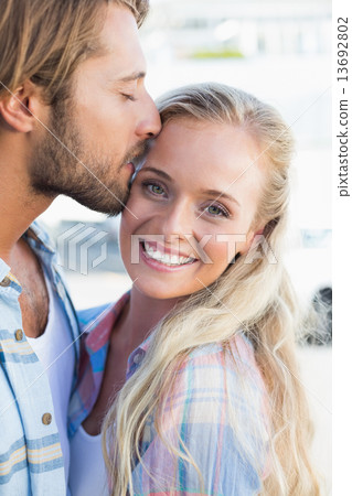 Attractive couple standing and hugging Attractive couple standing and hugging 13692802