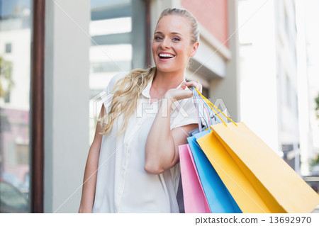 Pretty blonde holding shopping bags Pretty blonde holding shopping bags 13692970