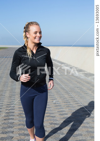Fit blonde jogging on the pier Fit blonde jogging on the pier 13693005