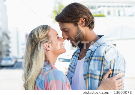 Attractive couple standing and hugging Attractive couple standing and hugging 13693078