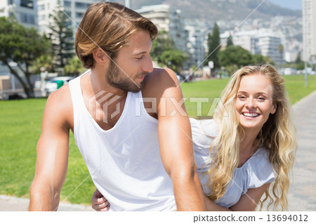 Cute couple on a bike ride 13694012