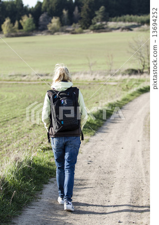 back of walking girl back of walking girl 13694252