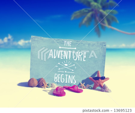 Blue Wooden Board with other Objects by the Beach 13695123