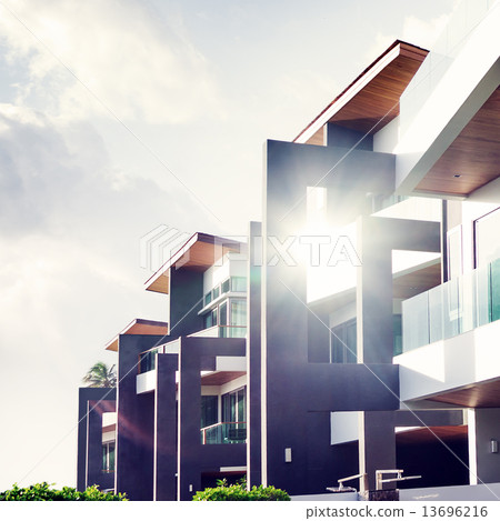 Contemporary Residential Building Exterior in the Daylight Contemporary Residential Building Exterior in the Daylight 13696216