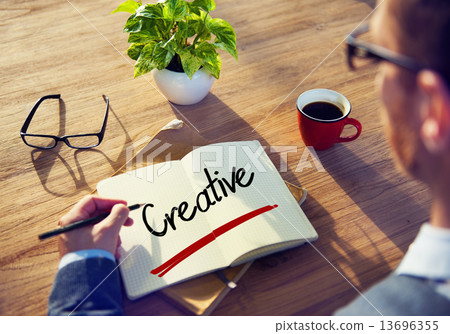 A Businessman Brainstorming About Creativity 13696355